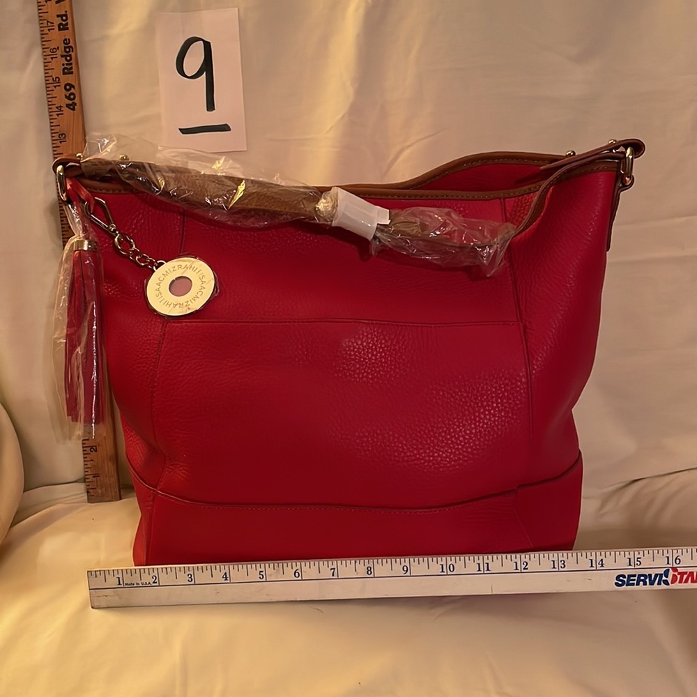 Brand new red leather Isaac Mizrahi shoulder bag. Brown not adjustable strap